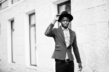 Fashion portrait of black african american man on green velvet j