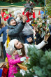 © JackF - Parents with kids at X-mas market.