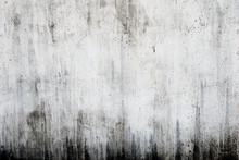 汚れたコンクリートの白い壁