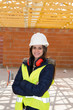 © OceanProd - Female architect on construction site, woman supervising building