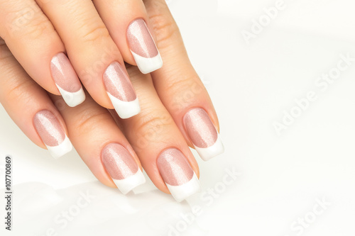 Fotografering Woman hands with french manicure  close-up