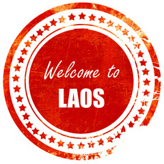 Welcome to laos, grunge red rubber stamp on a solid white backgr