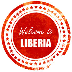 Welcome to liberia, grunge red rubber stamp on a solid white bac