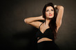© Voyagerix - woman in sensual black dress on dark