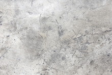 Footprint On Concrete Ground