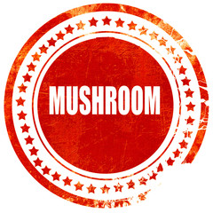 Delicious mushroom sign, grunge red rubber stamp on a solid whit