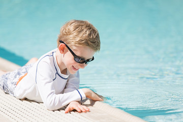 Wall Mural - kid enjoying the pool