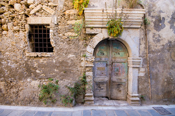 Poster - Old door in the ancient wall