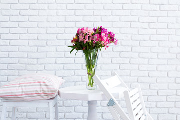 Poster - Vase full of colorful flowers on table