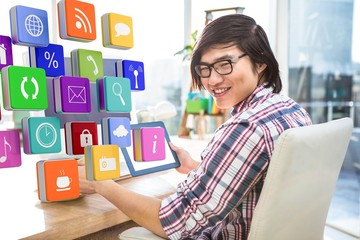 Canvas Print - composite image of hipster businessman using tablet