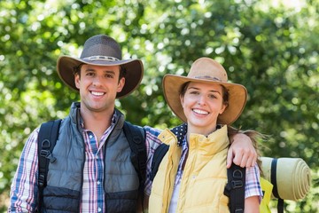 Wall Mural - Portrait of happy couple during hiking 