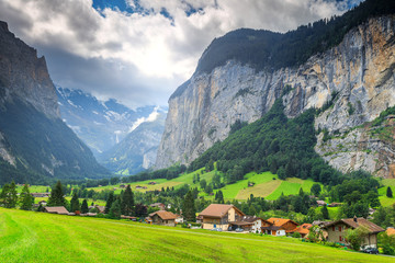 Wall Mural - Spectacular Lauterbrunnen town with high cliffs,Bernese Oberland,Switzerland,Europe