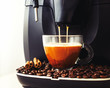 The preparation of coffee in the coffee machine close-up
