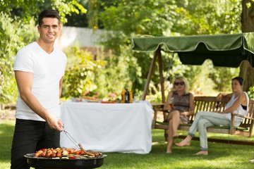 Poster - Barbecue chef in the garden