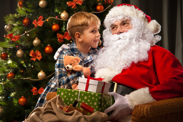 Wall Mural - Santa Claus and a little boy