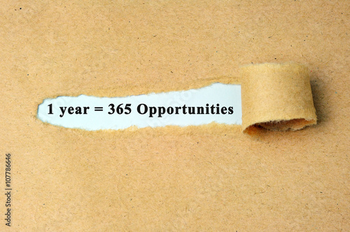 Ripped Paper With 1 Year 365 Opportunities Text Stock Photo Adobe Stock