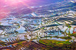 Terraced Rice Fields in Water Season in South China at Sunset