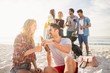 © WavebreakmediaMicro - Happy friends having fun around barbecue