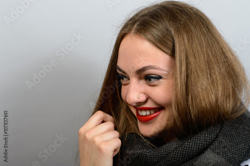 Smiling Woman in scarf, looks like angelina jolie Poster
