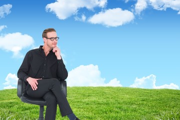 Poster - Composite image of thoughtful businessman sitting