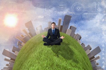 Poster - Composite image of calm businessman sitting in lotus pose