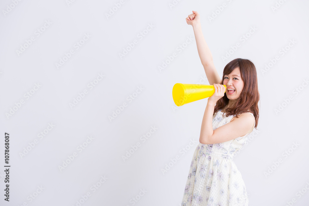 応援　女性 メガホンで応援する女性 Stock Photo | Adobe Stock