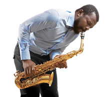 African American Jazz Musician Playing The Saxophone, Isolated On White
