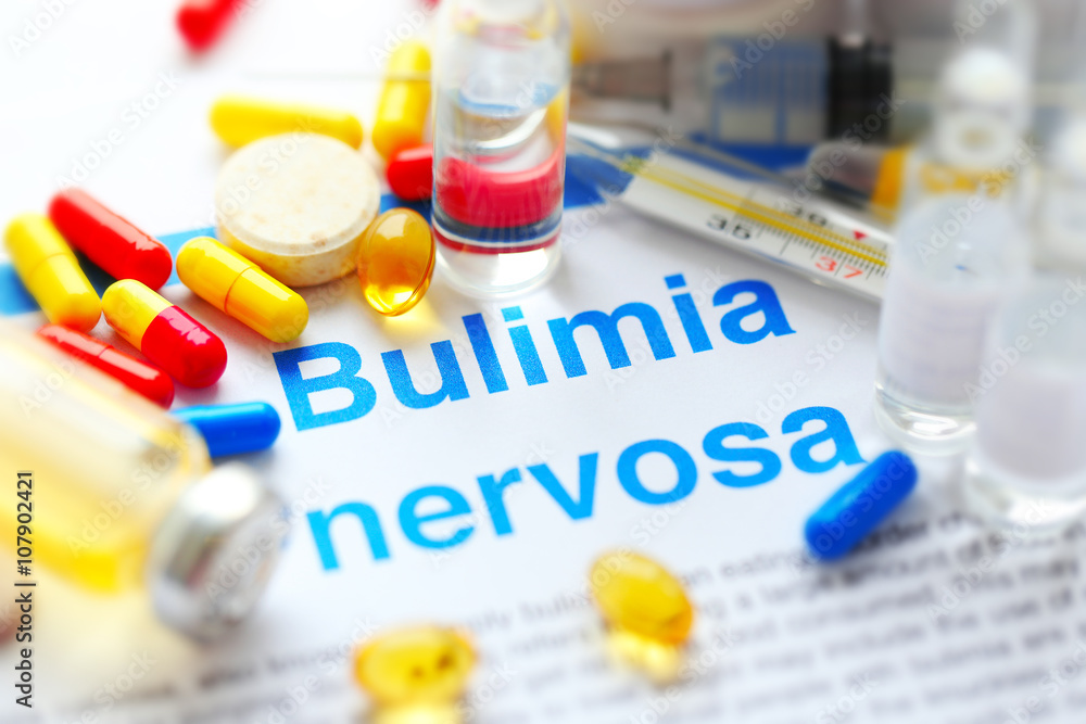 Medicines and Bulimia diagnosis written on paper closeup