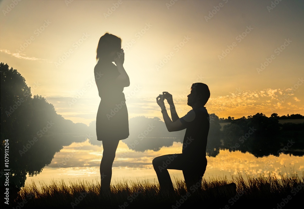 Wedding proposal concept. Young couple have dating at sun set. Man in ...