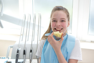 Wall Mural - Young girl at dentist., dental treatment 
