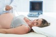 © WavebreakMediaMicro - Pregnant woman receiving ultrasound treatment