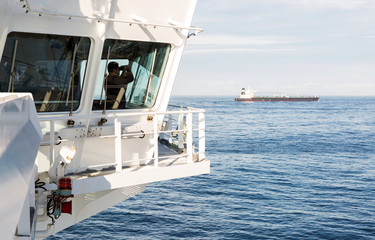 Navigation bridge of oil tanker with watch officer