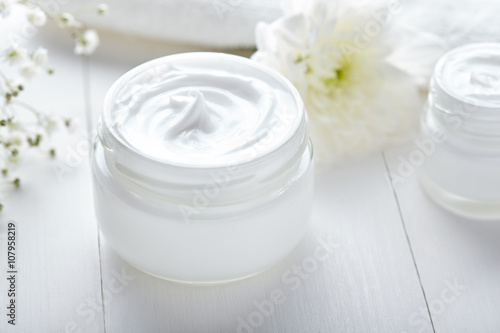 Fotografie, Obraz Anti wrinkle cosmetic cream with herbal flowers face, skin and body care hygiene