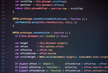 colorful programming php and html code on a monitor.