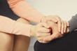 © Africa Studio - Man and woman holding hands closeup