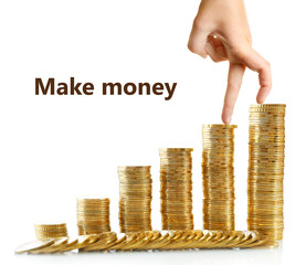 Wall Mural - Financial success concept. Female fingers going up of coins, isolated on white