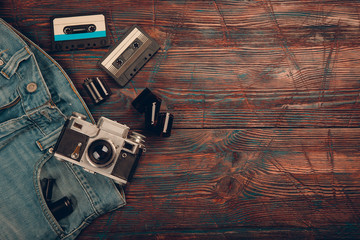 Wall Mural - Old vintage camera, jeans and Cassette tape