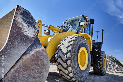 Fotografie, Obraz Heavy equipment machine wheel loader on construction jobsite