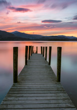 Vibrant Pink And Orange Sunset At Ashness Jetty In The Lake District, UK.