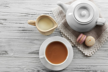 Wall Mural - Milk tea with tea pot on white background.