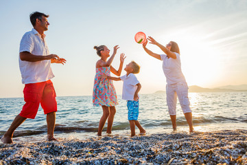 Wall Mural - Family play on beach