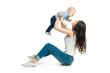 Young Mother With Her Son Over White Background