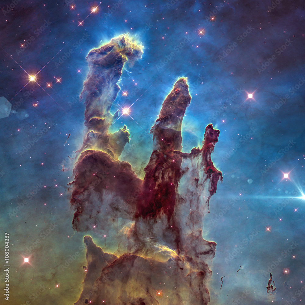 The Eagle Nebula's Pillars of Creation. Retouched image. Elements of this image furnished by NASA. - obrazy, fototapety, plakaty 