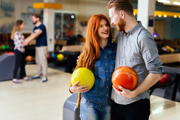 Wall Mural - Beautiful couple dating and bowling