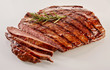 © exclusive-design - Carved barbecued medium-rare flank steak