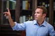 © WavebreakMediaMicro - Confident man gesturing while talking