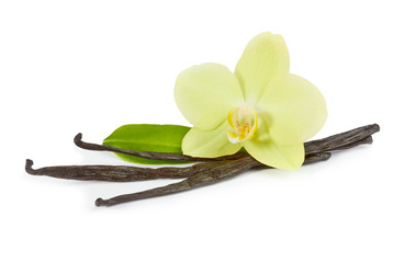 Wall Mural - Vanilla sticks and yellow orchid with green leaf