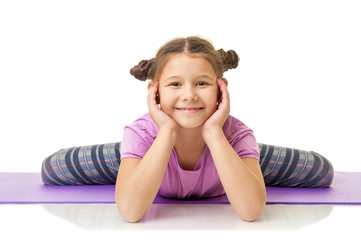 little girl doing fitness exercises