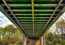 Rusty Underside Of A Rail Road Bridge