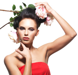 Wall Mural - Portrait of beautiful young woman with flowers in hair.